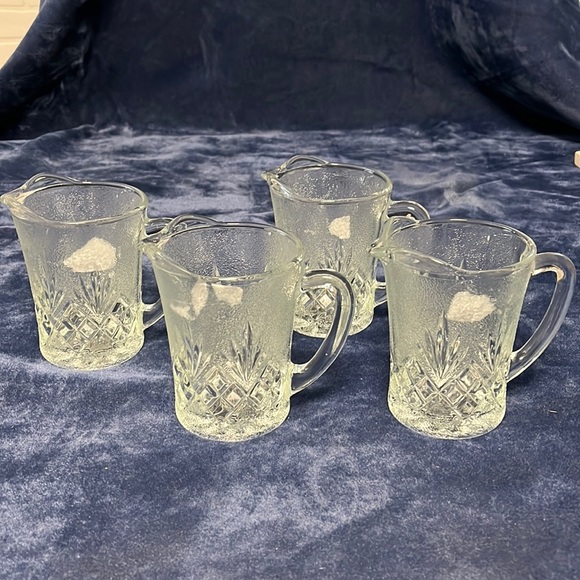 Set of four small glass pitchers - Picture 1 of 5
